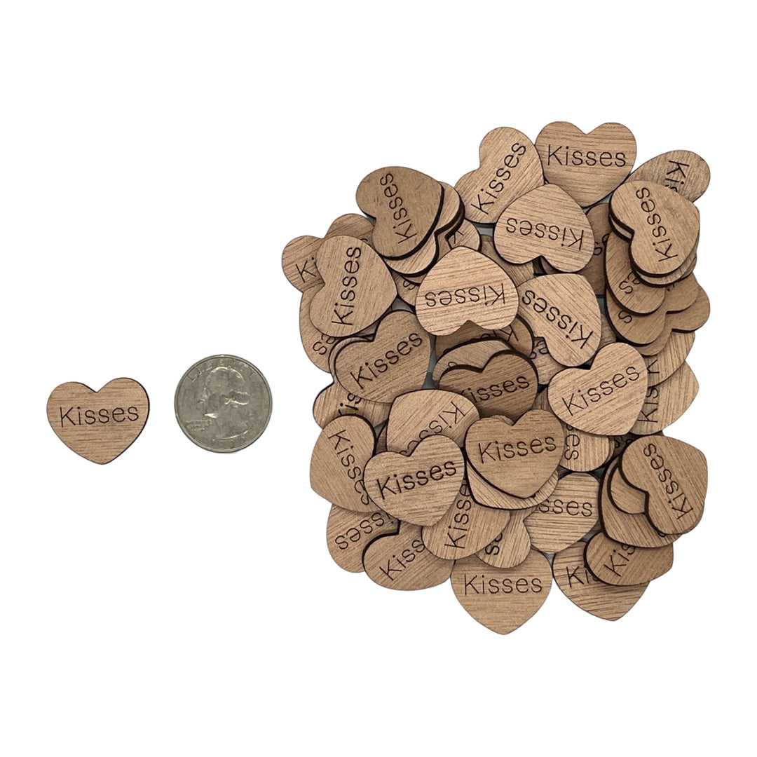 1 inch wood hearts with the word kisses on them confetti