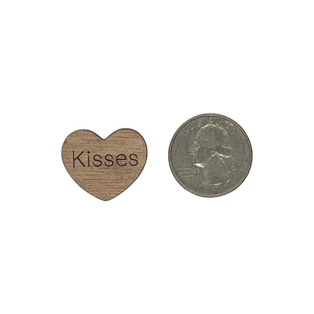 1 inch wood hearts with the word kisses on them confetti